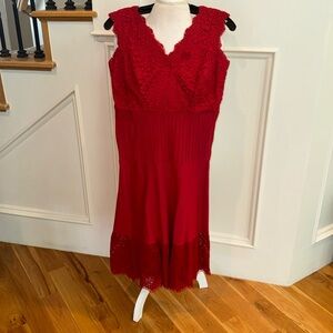Sensational red dress: extremely flattering sizes medium and fits 6 to 8